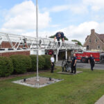 firefighters test ladder at South High Street station